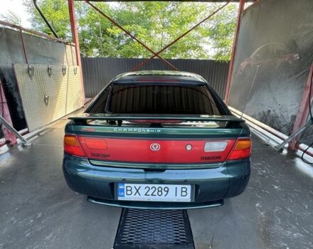 Зеленый Мазда 323, объемом двигателя 1.5 л и пробегом 451 тыс. км за 2600 $, фото 2 на Automoto.ua