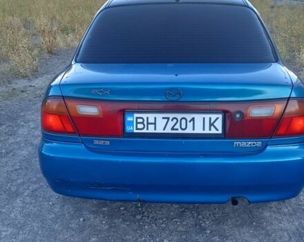 Зеленый Мазда 323, объемом двигателя 1.5 л и пробегом 300 тыс. км за 1903 $, фото 2 на Automoto.ua
