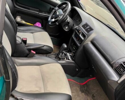 Зелений Мазда 323, об'ємом двигуна 1.8 л та пробігом 161 тис. км за 3200 $, фото 5 на Automoto.ua