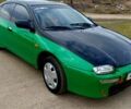 Зеленый Мазда 323, объемом двигателя 10 л и пробегом 100 тыс. км за 960 $, фото 2 на Automoto.ua