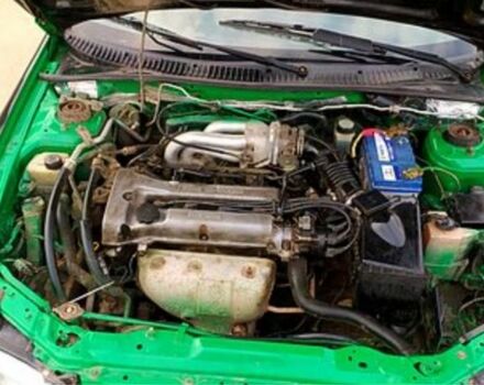 Зеленый Мазда 323, объемом двигателя 10 л и пробегом 100 тыс. км за 960 $, фото 5 на Automoto.ua