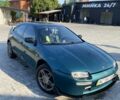 Зелений Мазда 323, об'ємом двигуна 1.5 л та пробігом 300 тис. км за 2000 $, фото 1 на Automoto.ua