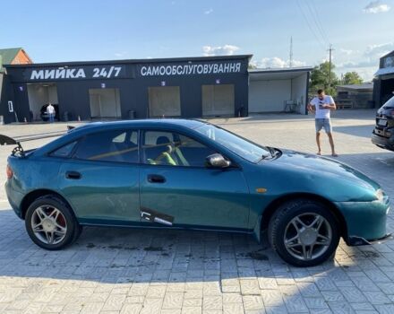 Зелений Мазда 323, об'ємом двигуна 1.5 л та пробігом 300 тис. км за 2000 $, фото 1 на Automoto.ua