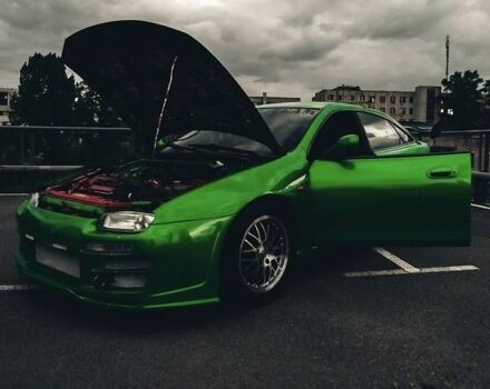 Зеленый Мазда 323, объемом двигателя 2 л и пробегом 200 тыс. км за 4200 $, фото 2 на Automoto.ua