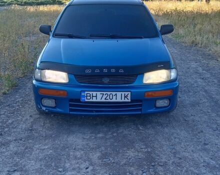 Зеленый Мазда 323, объемом двигателя 1.5 л и пробегом 300 тыс. км за 1903 $, фото 3 на Automoto.ua