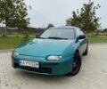 Зеленый Мазда 323, объемом двигателя 1.5 л и пробегом 250 тыс. км за 2000 $, фото 1 на Automoto.ua