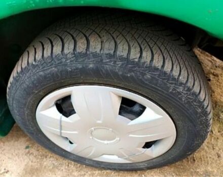 Зеленый Мазда 323, объемом двигателя 10 л и пробегом 100 тыс. км за 960 $, фото 6 на Automoto.ua