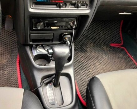 Зелений Мазда 323, об'ємом двигуна 1.8 л та пробігом 161 тис. км за 3200 $, фото 3 на Automoto.ua