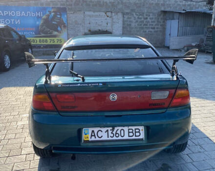Зелений Мазда 323, об'ємом двигуна 1.5 л та пробігом 300 тис. км за 2100 $, фото 4 на Automoto.ua