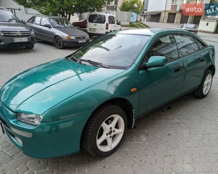 Зеленый Мазда 323, объемом двигателя 1.49 л и пробегом 290 тыс. км за 1799 $, фото 1 на Automoto.ua