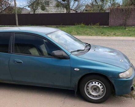 Зеленый Мазда 323, объемом двигателя 1.5 л и пробегом 290 тыс. км за 1500 $, фото 20 на Automoto.ua