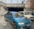 Зеленый Мазда 323, объемом двигателя 1.5 л и пробегом 424 тыс. км за 1500 $, фото 1 на Automoto.ua