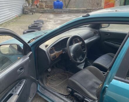 Зеленый Мазда 323, объемом двигателя 1.5 л и пробегом 424 тыс. км за 1500 $, фото 4 на Automoto.ua