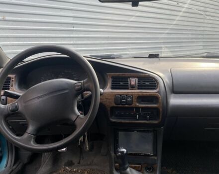 Зеленый Мазда 323, объемом двигателя 1.5 л и пробегом 424 тыс. км за 1500 $, фото 2 на Automoto.ua