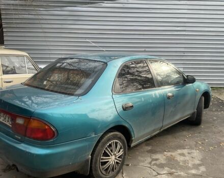 Зеленый Мазда 323, объемом двигателя 1.5 л и пробегом 424 тыс. км за 1500 $, фото 6 на Automoto.ua