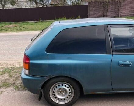 Зеленый Мазда 323, объемом двигателя 1.5 л и пробегом 290 тыс. км за 1500 $, фото 26 на Automoto.ua