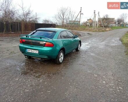 Зелений Мазда 323, об'ємом двигуна 1.49 л та пробігом 350 тис. км за 2100 $, фото 4 на Automoto.ua