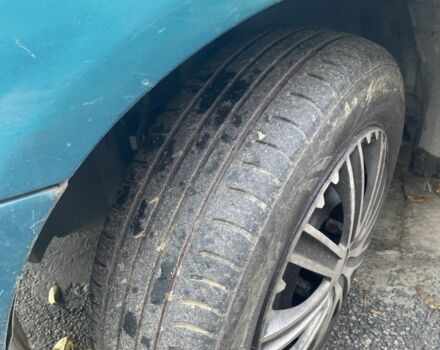 Зеленый Мазда 323, объемом двигателя 1.5 л и пробегом 424 тыс. км за 1500 $, фото 1 на Automoto.ua