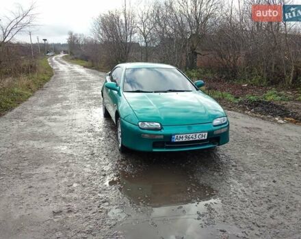 Зелений Мазда 323, об'ємом двигуна 1.49 л та пробігом 350 тис. км за 2100 $, фото 6 на Automoto.ua