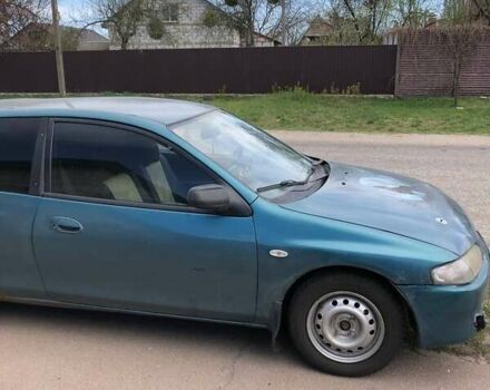 Зеленый Мазда 323, объемом двигателя 1.5 л и пробегом 290 тыс. км за 1500 $, фото 30 на Automoto.ua