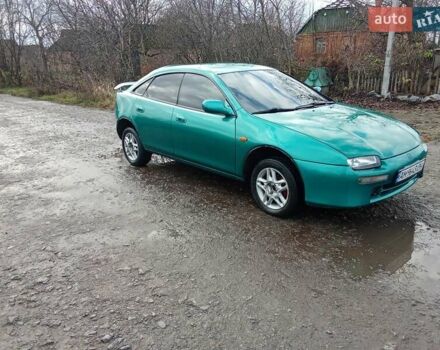 Зелений Мазда 323, об'ємом двигуна 1.49 л та пробігом 350 тис. км за 2100 $, фото 5 на Automoto.ua