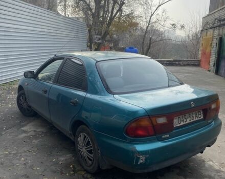 Зеленый Мазда 323, объемом двигателя 1.5 л и пробегом 424 тыс. км за 1500 $, фото 8 на Automoto.ua