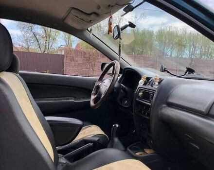 Зеленый Мазда 323, объемом двигателя 1.5 л и пробегом 290 тыс. км за 1500 $, фото 5 на Automoto.ua