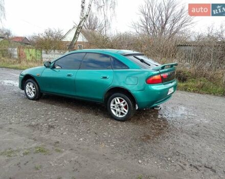 Зелений Мазда 323, об'ємом двигуна 1.49 л та пробігом 350 тис. км за 2100 $, фото 9 на Automoto.ua