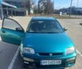 Зеленый Мазда 323, объемом двигателя 1.5 л и пробегом 319 тыс. км за 2200 $, фото 1 на Automoto.ua