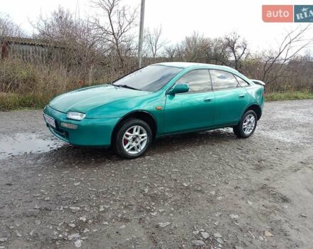 Зелений Мазда 323, об'ємом двигуна 1.49 л та пробігом 350 тис. км за 2100 $, фото 7 на Automoto.ua