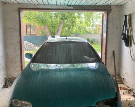 Зелений Мазда 323, об'ємом двигуна 1.49 л та пробігом 327 тис. км за 800 $, фото 2 на Automoto.ua