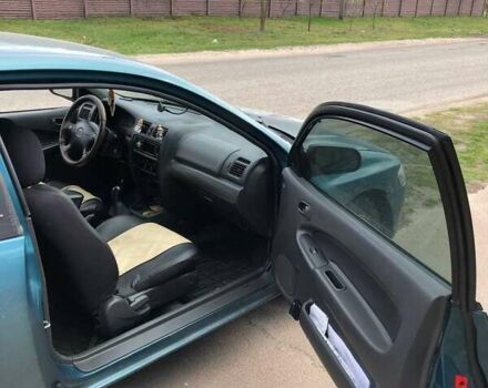 Зеленый Мазда 323, объемом двигателя 1.5 л и пробегом 290 тыс. км за 1500 $, фото 8 на Automoto.ua