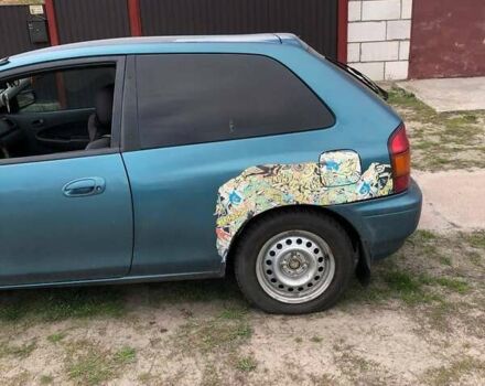 Зеленый Мазда 323, объемом двигателя 1.5 л и пробегом 290 тыс. км за 1500 $, фото 31 на Automoto.ua