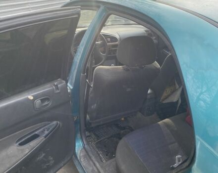 Зеленый Мазда 323, объемом двигателя 1.5 л и пробегом 424 тыс. км за 1500 $, фото 3 на Automoto.ua