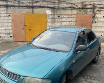 Зеленый Мазда 323, объемом двигателя 1.5 л и пробегом 424 тыс. км за 1500 $, фото 5 на Automoto.ua