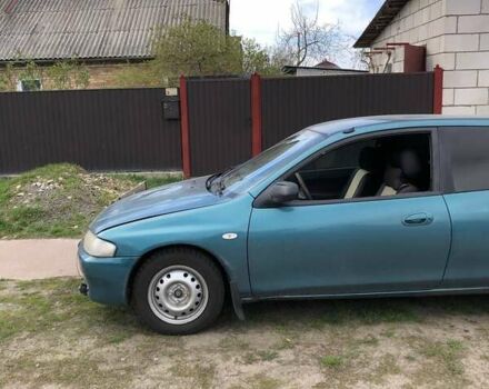 Зеленый Мазда 323, объемом двигателя 1.5 л и пробегом 290 тыс. км за 1500 $, фото 32 на Automoto.ua