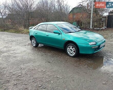 Зелений Мазда 323, об'ємом двигуна 1.49 л та пробігом 350 тис. км за 2100 $, фото 1 на Automoto.ua