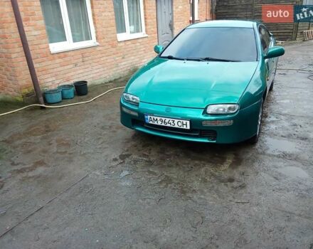 Зелений Мазда 323, об'ємом двигуна 1.49 л та пробігом 350 тис. км за 2100 $, фото 3 на Automoto.ua