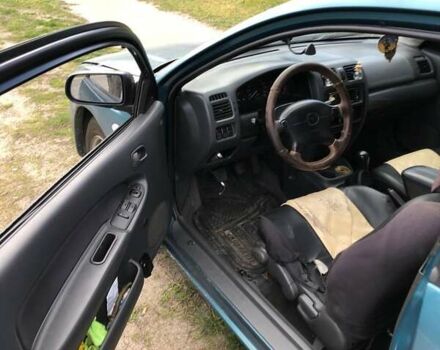 Зеленый Мазда 323, объемом двигателя 1.5 л и пробегом 290 тыс. км за 1500 $, фото 10 на Automoto.ua