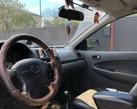 Зеленый Мазда 323, объемом двигателя 1.5 л и пробегом 290 тыс. км за 1500 $, фото 24 на Automoto.ua