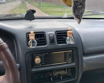 Зеленый Мазда 323, объемом двигателя 1.5 л и пробегом 290 тыс. км за 1500 $, фото 2 на Automoto.ua