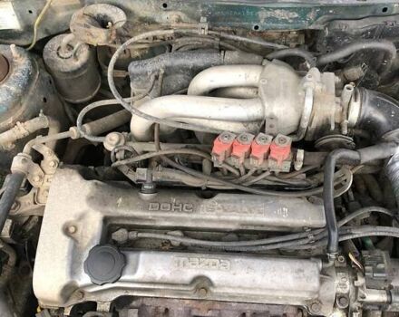 Зеленый Мазда 323, объемом двигателя 1.5 л и пробегом 290 тыс. км за 1500 $, фото 16 на Automoto.ua