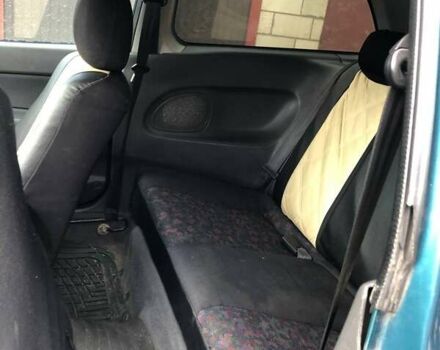 Зеленый Мазда 323, объемом двигателя 1.5 л и пробегом 290 тыс. км за 1500 $, фото 3 на Automoto.ua