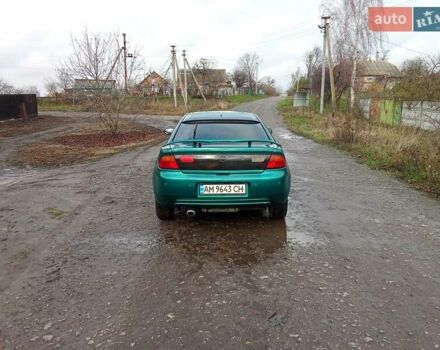 Зелений Мазда 323, об'ємом двигуна 1.49 л та пробігом 350 тис. км за 2100 $, фото 8 на Automoto.ua