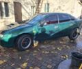 Зеленый Мазда 323, объемом двигателя 1.5 л и пробегом 270 тыс. км за 2199 $, фото 2 на Automoto.ua