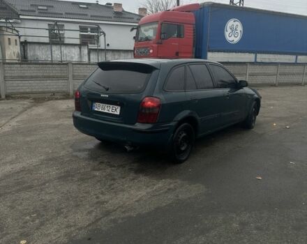 Зеленый Мазда 323, объемом двигателя 1.5 л и пробегом 400 тыс. км за 1500 $, фото 2 на Automoto.ua