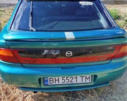 Зеленый Мазда 323, объемом двигателя 1.5 л и пробегом 7 тыс. км за 1600 $, фото 3 на Automoto.ua