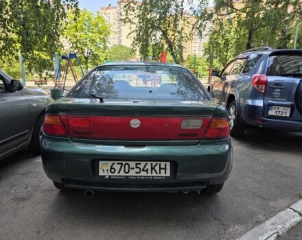 Зелений Мазда 323, об'ємом двигуна 1.5 л та пробігом 278 тис. км за 1068 $, фото 2 на Automoto.ua