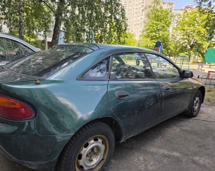 Зелений Мазда 323, об'ємом двигуна 1.5 л та пробігом 278 тис. км за 1068 $, фото 1 на Automoto.ua