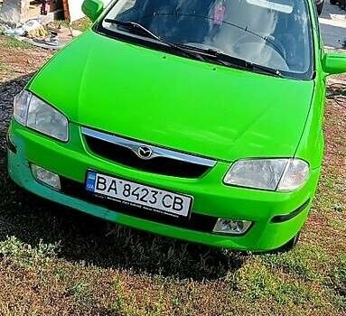 Зеленый Мазда 323, объемом двигателя 1.3 л и пробегом 254 тыс. км за 1900 $, фото 8 на Automoto.ua